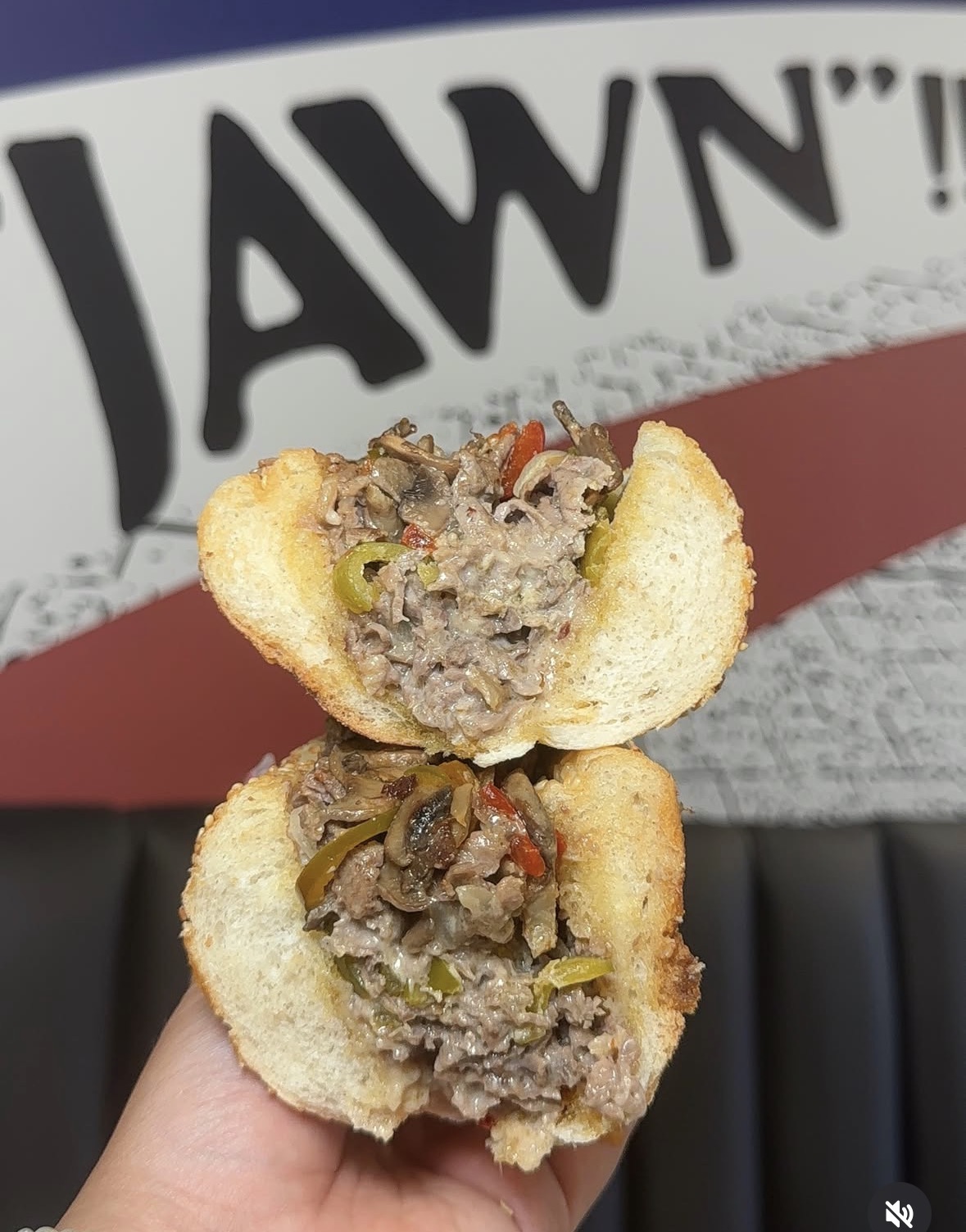 The Champ ribeye cheesesteak with peppers and mushrooms