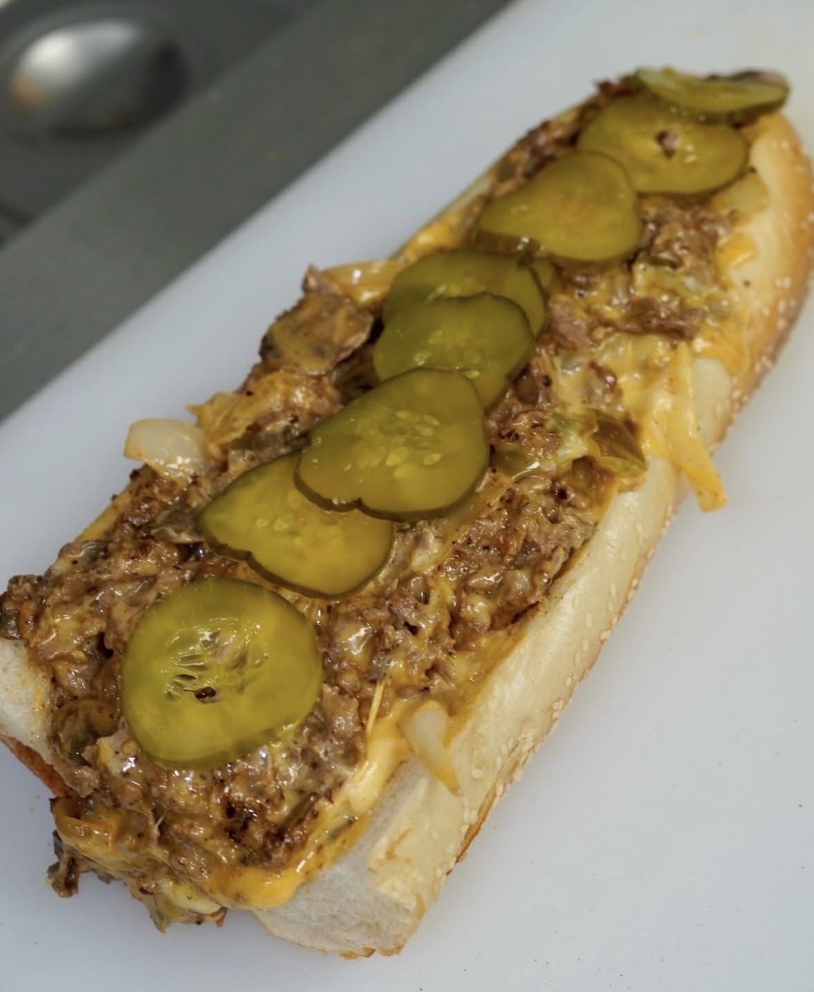 Broad Street Bully cheesesteak with pickles and peppers